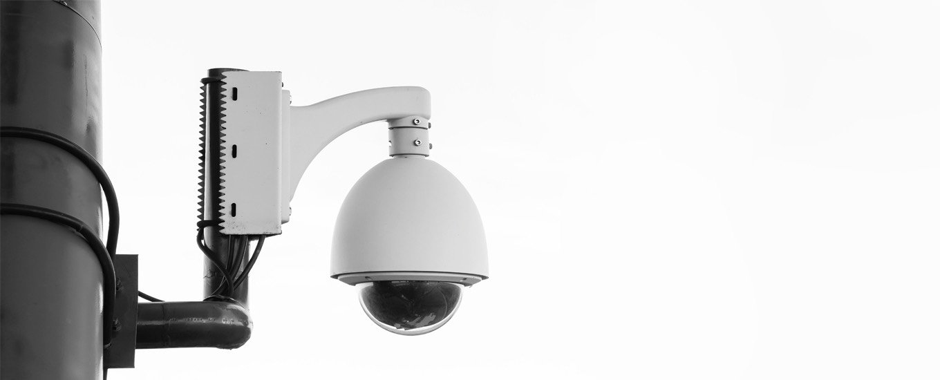 PTZ speed dome camera on a wall bracket